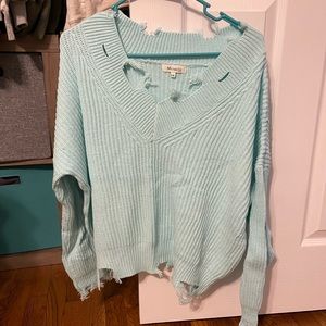 Distressed sweater